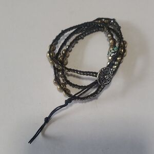Lucky Brand Black and Gold Wrap Bracelet